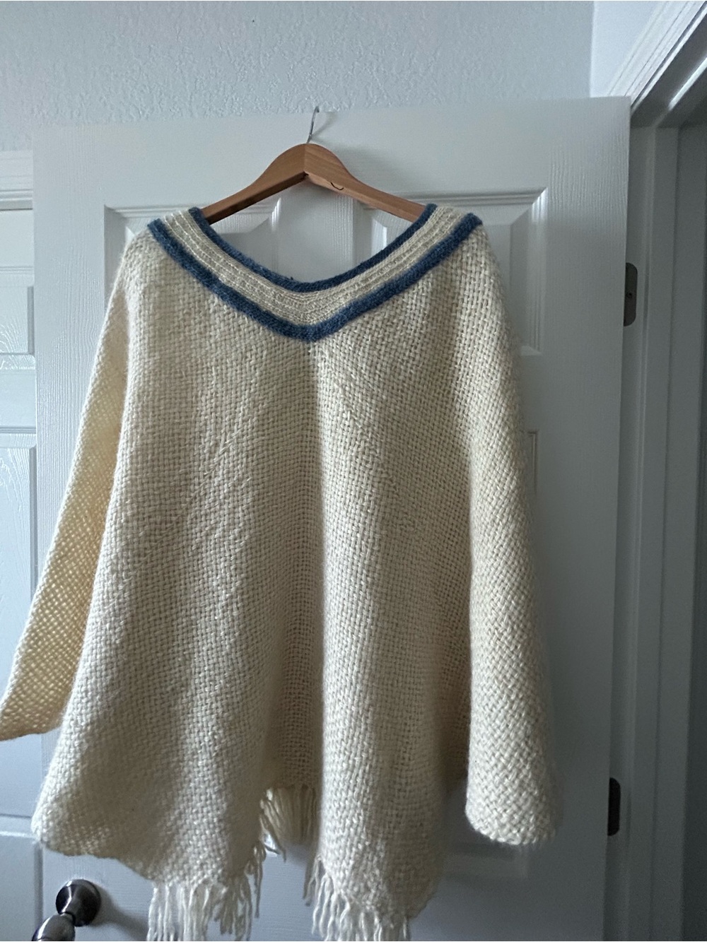 Lamb Wool Cream V-Neck Fringe Poncho with Blue Trim